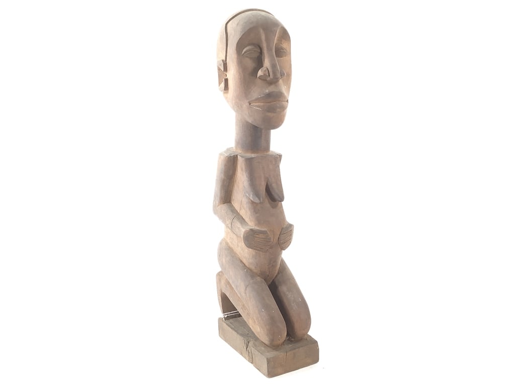 Carved Wood Figure Signed Kampata: Contemporary artist carving, marked Kampata on the bottom. 15 1/2"H. Provenance: Collected by Sophia and Roy Sieber.
