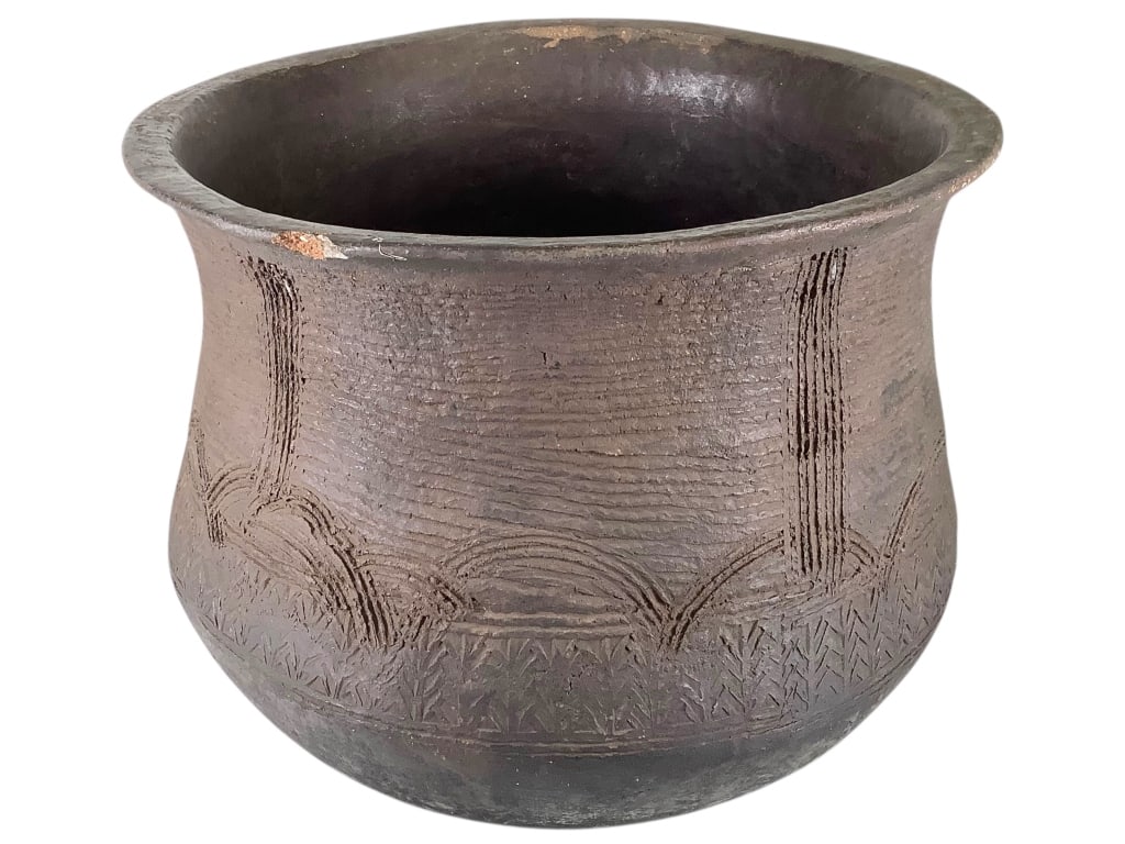 Cameroon Incised Ceramic Pot: 12 1/2"Dia. x 10 1/2"H. Old chip at rim. Provenance: Collected by Sophie and Roy Sieber.