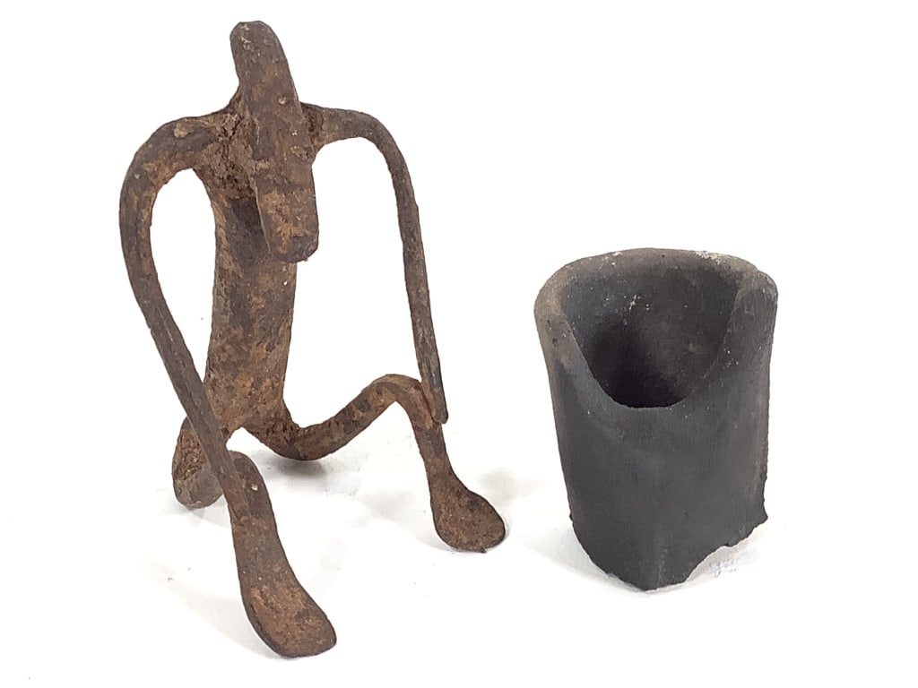 Dogon Metal Seated Figure: 2 3/4"H. Provenance: Collected by Sophia and Roy Sieber.