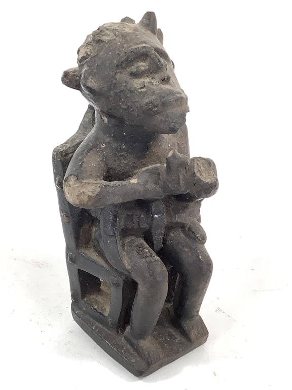 Seated Ceramic Figure (1 of 6)