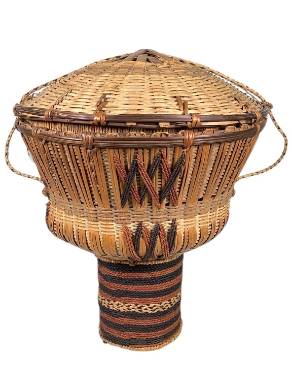 Lidded Wickerwork Basket: 12"Dia., 13"H. Provenance: Collected by Sophia and Roy Sieber.