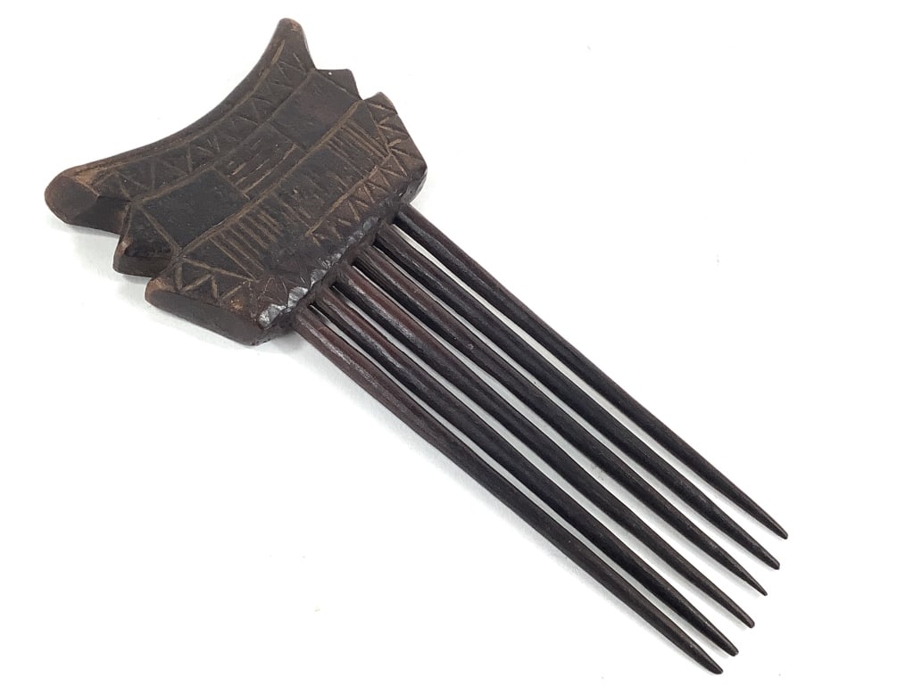 Akan Carved Wood Comb From Ghana: 7 1/2"L x 3 1/2"W. Provenance: Collected by Sophia and Roy Sieber.