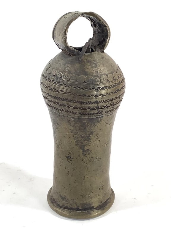 Verre Peoples Kerumd Bell: 8"H. Referenced in 'Surviving Works: Context In Verre Arts' by Tim Chappel, Richard Fardon, and Klaus Piepel. Provenance: Collected by Sophia and Roy Sieber.