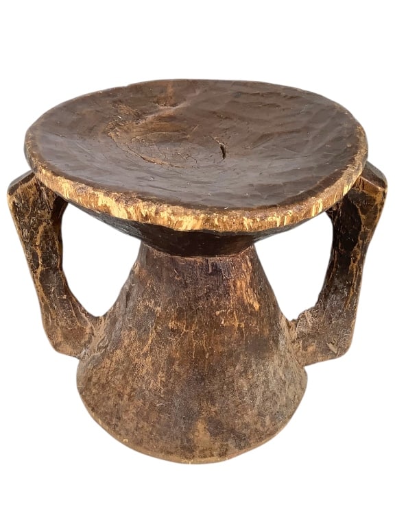 Carved Wood Footed Stool: 13"L x 11"H. Provenance: Collected by Sophia and Roy Sieber.