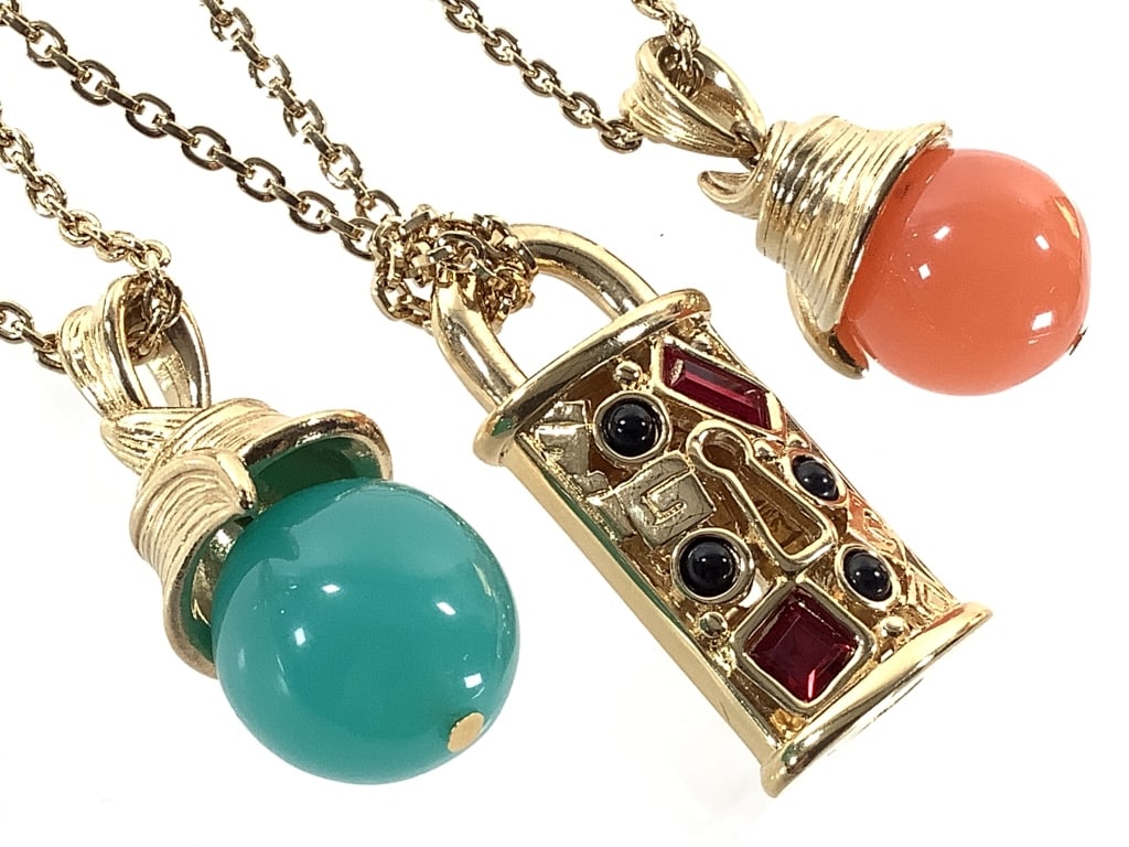 Givenchy Orb & Lock Pendants on 37" L Necklaces: EDS aims to describe and photograph all items thoroughly and accurately, however other conditions present may not have been observed or noted. We encourage you to inspect items in person during previe