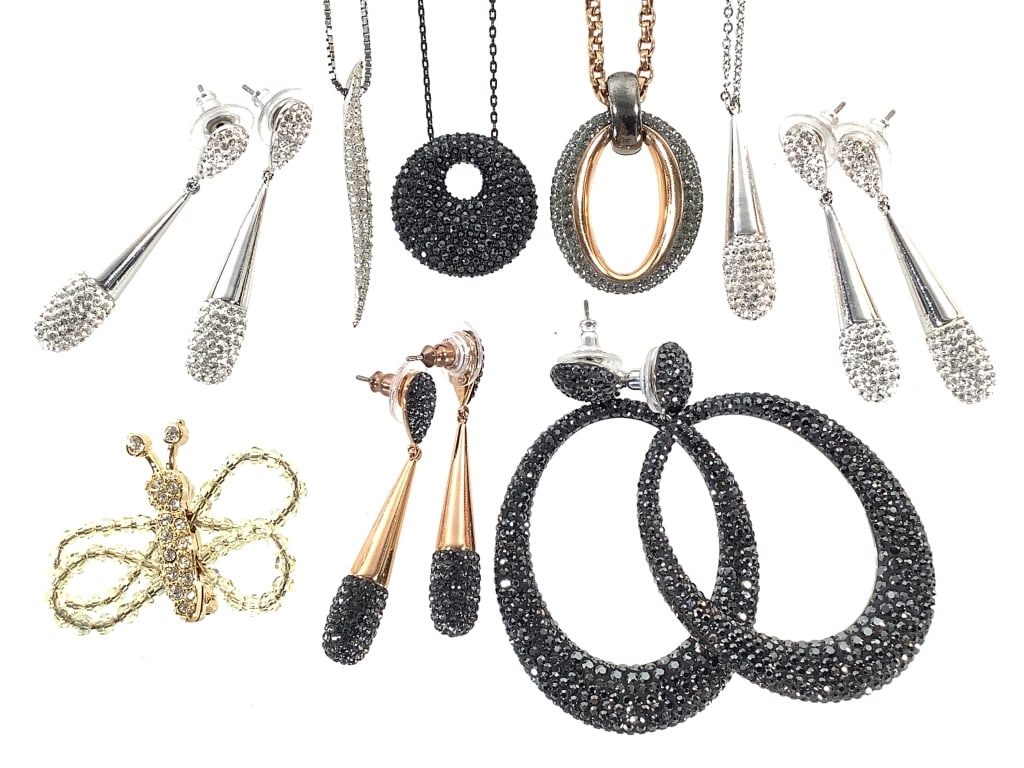 Swarovski Crystal Earrings Necklaces Pin: Includes 4 pairs of earrings, 4 necklaces 16" - 20" L, and butterfly pin 1 1/2" W. EDS aims to describe and photograph all items thoroughly and accurately, however other conditions present may not