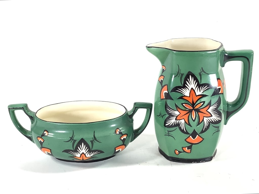 Erphila Czech Art Pottery Pitcher & Open Sugar: 6 3/4"H pitcher, 8 1/4"W bowl. c.1920-30s Art Deco decoration in black, white and orange on dark green base with cream interior. Stamp marks on bottom, some light crazing, glaze loss at base. Provenan
