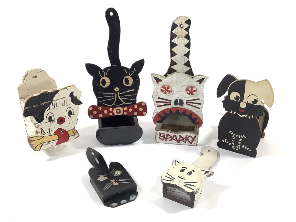 6 Folk Art Cat & Dog Matchbox Holders: 5 1/2" - 10 1/2"H overall. 1 of many lots. The walls of the Itter kitchen were covered with hand crafted and painted wood matchbox holders collected over a lifetime. NOTE: due to location these are al