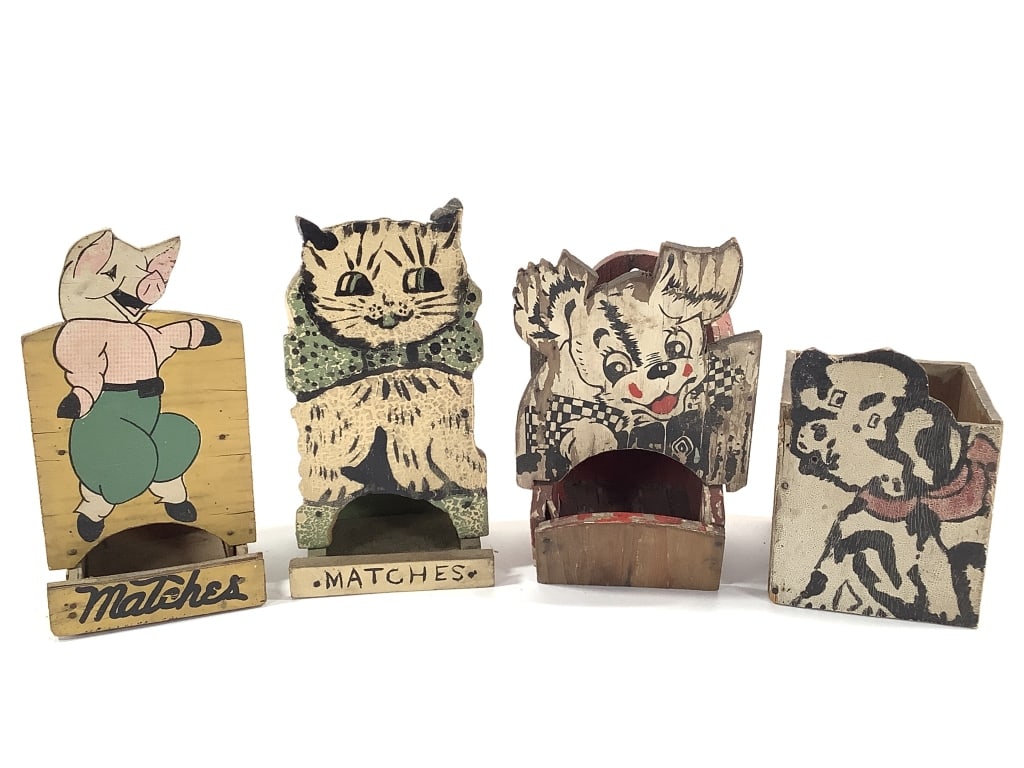 4 Folk Art Kitchen Matchbox Holders Dogs Cat & Pig: 5 1/2" - 7 1/2"H. Litho pattern decal/stencil cover matchboxes. Pig has some delamination to the wood. 1 of many lots. The walls of the Itter kitchen were covered with hand crafted and painted wood ma