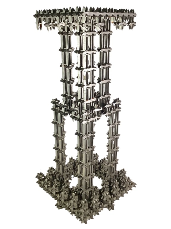 Tramp Art Skyscraper Sculpture Radiator Paint: 12 3/4" square at base, 29 1/2"H overall. Radiator paint wood slat interlocking construction, similar to crown of thorns pattern. Losses and repairs. Provenance: Collection of William and Diane Itter.