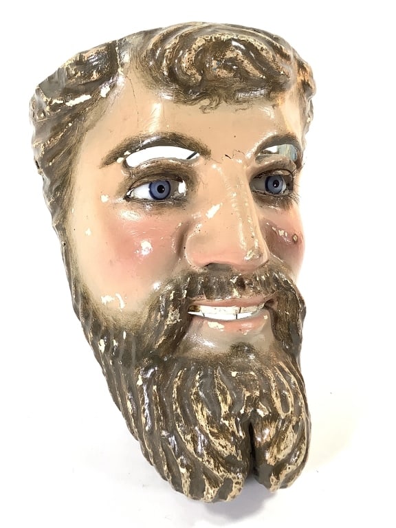 Party Mask w Closing Eyelids & Real Hair Eyelashes: 9 3/4"L. Carved wood with plaster or paper mache covered and detailed surface. Painted finish, some losses and crack over one eye. Cord below beard closes the eyelids over glass eyes. Provenance: Coll