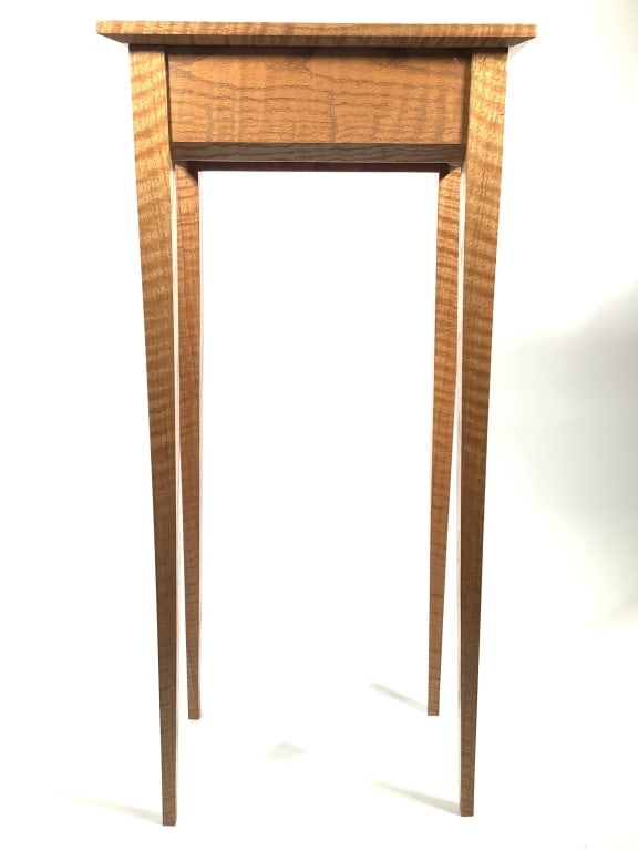 Wm Itter Handmade Birdseye Maple Display Stand: 16 3/4"W x 10 3/8"D top, 37 1/8"H. Mixed woods with walnut and birdseye maple inset top on 4 tapered legs. Provenance: Collection of William and Diane Itter.