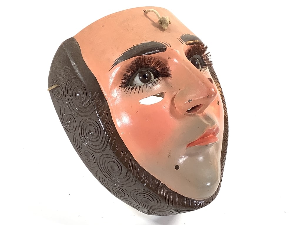 Parachico Festival Mask Chiapas Mexico: Traditional bearded mask, glass eyes, hair eyelashes. Polychrome carved wood. 8"H, 6 3/4"W. Very good condition. Note brown, not blue, eyes. Provenance: Collection of William and Diane Itter.