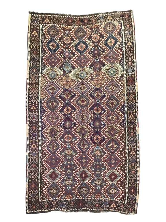 117" x 68" Turkish Aksaray Woven Kilim Rug: Fair condition overall. Provenance: Collection of William and Diane Itter.