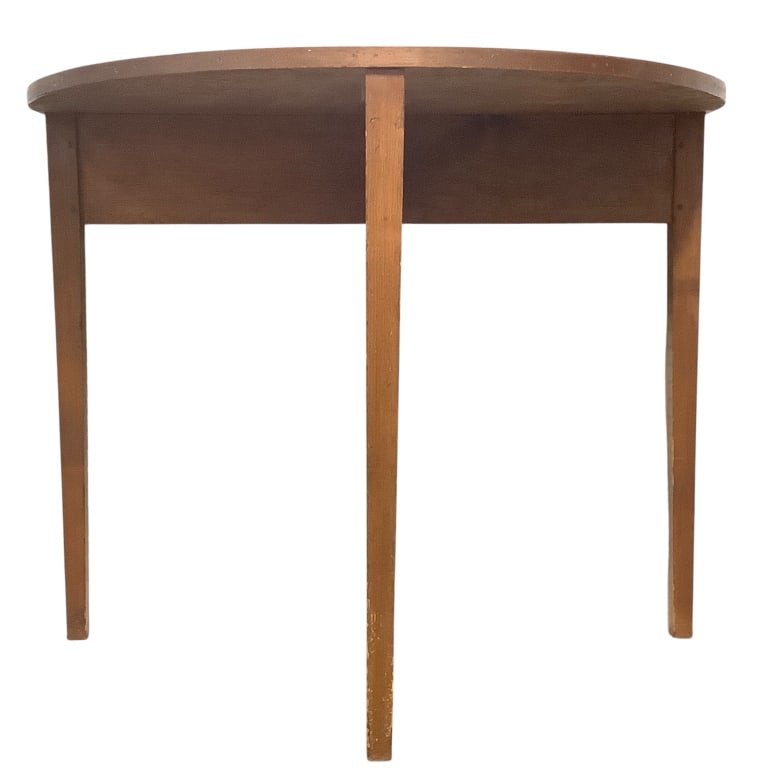 Demilune Hall Table: 36 1/4"W x 19"D x 30"D. Simple tapered legs. Solid wood board construction. Provenance: Collection of William and Diane Itter.