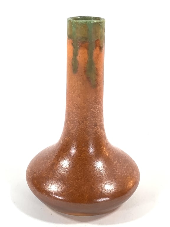 Amaco American Art & Clay Co Vase #74: 8 1/4"H vase, mottled brown body, green drip at top edge. Unglazed bottom with stamp mark, raised model number and incised artist symbol. American Art Clay Company, Inc. (AMACO) was founded in 1919 by