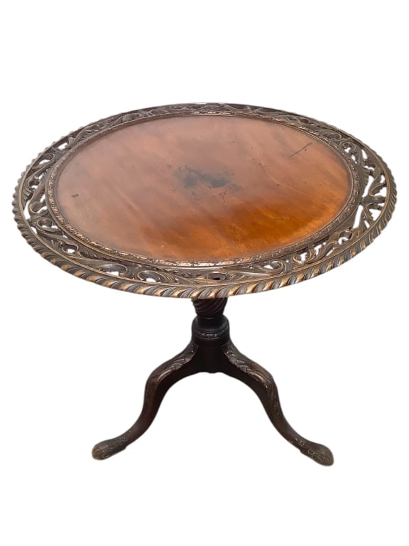 Antique Piecrust Tilt Top Table: 30"Dia. x 29"H. Antique mahogany tilt-top table with rich, dark patina. Fret pierced and carved edge. Collection of William and Diane itter.