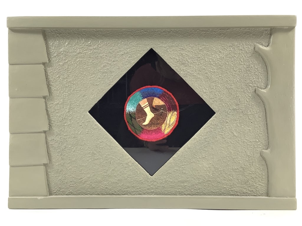Tom Lundberg April 1989 Framed Embroidery: Lundberg, Thomas (American b. 1953). April. 1989, cotton, silk and metallic threads on wool in an artist made painted wood frame. 3 1/2" Diameter (Patch). 12 1/4? x 18" (Frame). Signed, titled, and