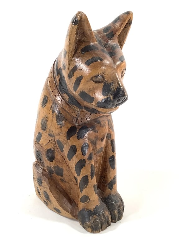 Folk Art Carved Figure Albert Dalley WI Signed: 11 3/4"H. Single log/branch - see photo of bottom. Spotted dog or cheetah form with bow tie / collar. Signed on back of collar, polychrome finish. Provenance: Collection of William and Diane Itter.