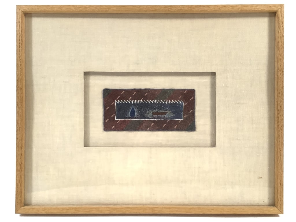 Tom Lundberg November Fence Framed Embroidery: Lundberg, Thomas (American b. 1953). November Fence. ND. Cotton and silk embroidery on linen. 3" x 6" (Sight). 14" x 17 1/2" (Frame). In a wood frame with fabric covered mat. Gallery label verso. Not