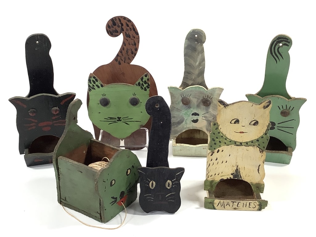 7 Folk Art Cat Matchbox & Dog Twine Holders: 7 1/2" - 11 1/4"H. 1 of many lots. The walls of the Itter kitchen were covered with hand crafted and painted wood matchbox holders collected over a lifetime. NOTE: due to location these are all as