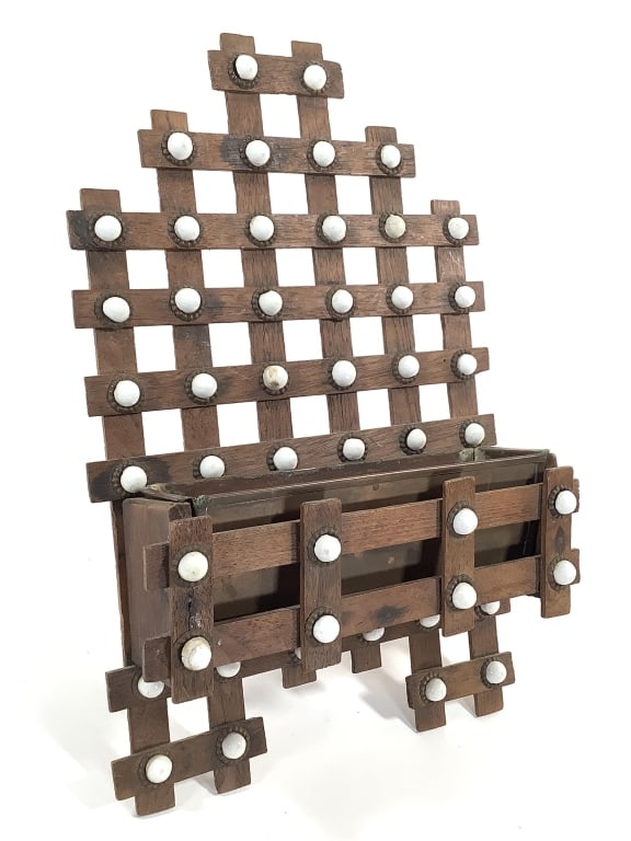 Folk Tramp Art Lattice Wall Mount Container: 13"H, 8 1/4"W x 2 3/4"D. White glazed furniture tacks decorate and attach the wood slats at intersections. Removable copper container. Provenance: Collection of William and Diane Itter.
