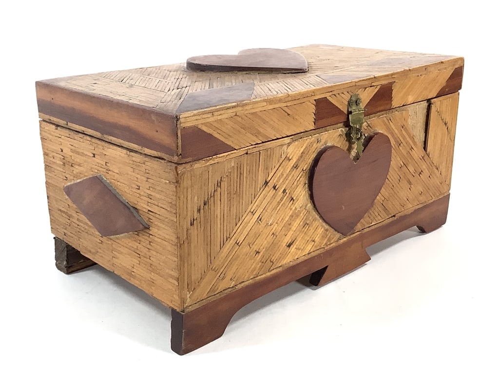 Tramp Art Match Stick Sweetheart Treasure Box: 12 1/2" x 6 3/4" x 6 1/4"H. Heart and diamond shape medallions, lined in red fabric. Losses at front. Provenance: Collection of William and Diane Itter.