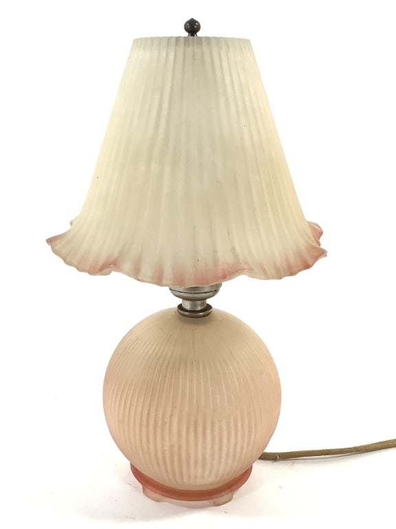 Boudoir Lamp Glass Base & Shade: 11"H. 1930-40s era pressed glass lamp and clip on shade with pink highlights. Provenance: Collection of William and Diane Itter.