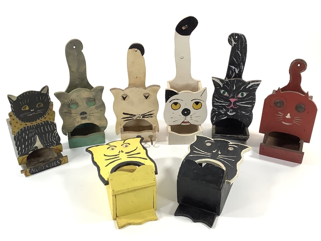8 Folk Art Cat Kitchen Matchbox Holders: Tallest is 11" and shortest is 8 1/2". 1 of many lots. The walls of the Itter kitchen were covered with hand crafted and painted wood matchbox holders collected over a lifetime. NOTE: due to location 