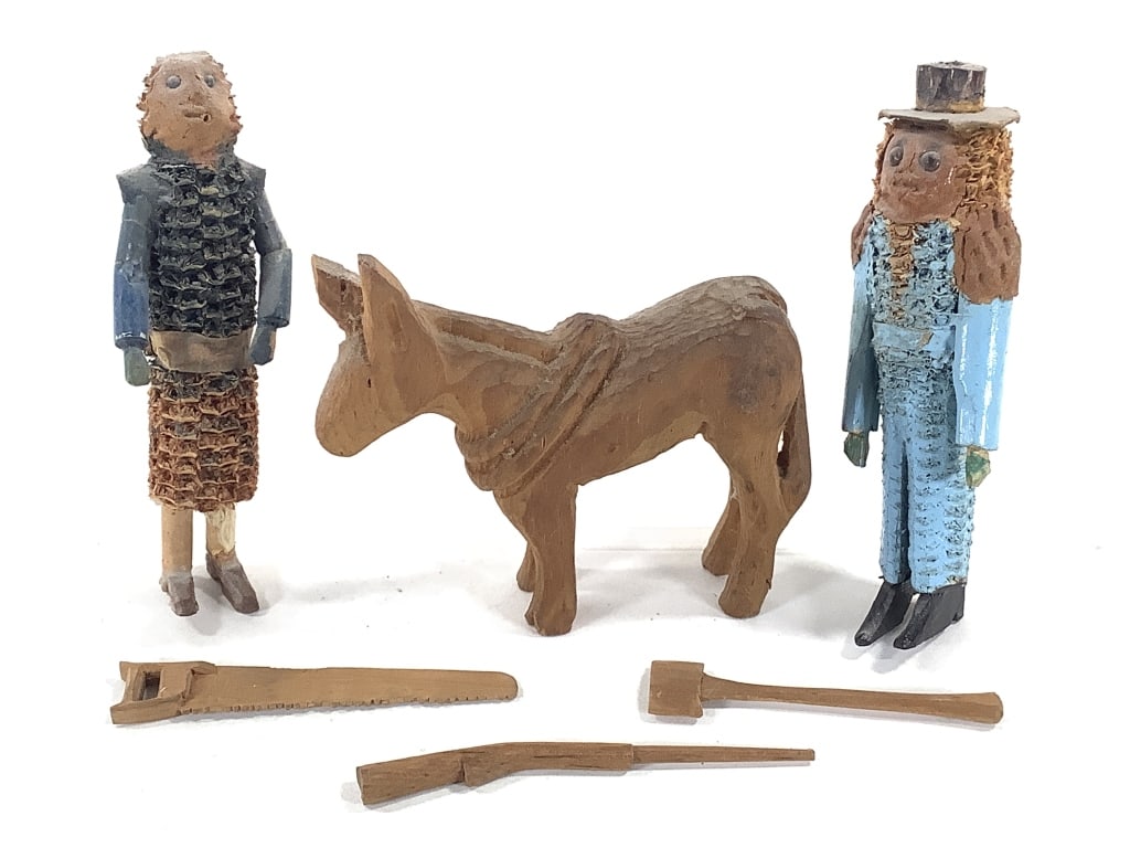 Folk Art Corn Cob Dolls Carved Wood Tools & Donkey: Rare, early primitive toys. 5 3/8" and 5 1/2"H dolls, painted corn cobs with added carved wood limbs and accessories. 4 3/4"L carved, unpainted wood donkey with harness. Carved wood rifle, saw and hat