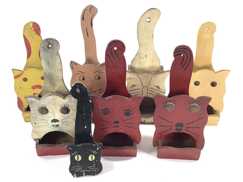 8 Folk Art Painted Wood Cat Matchbox Holders: 8" to 11 1/2"H. 1 of many lots. The walls of the Itter kitchen were covered with hand crafted and painted wood matchbox holders collected over a lifetime. NOTE: due to location these are all as