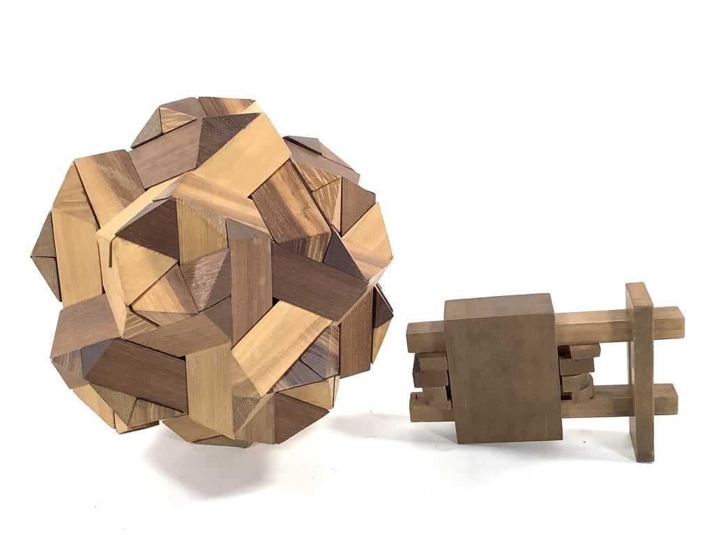 Bench Made Inter Locking Mixed Wood Ball & Whimsy: 6 1/2" muti-faceted inter locking 'ball'. 5" x 3 1/4" whimsy. Unsigned, presumed to be by William Itter. Provenance: Collection of William and Diane Itter.