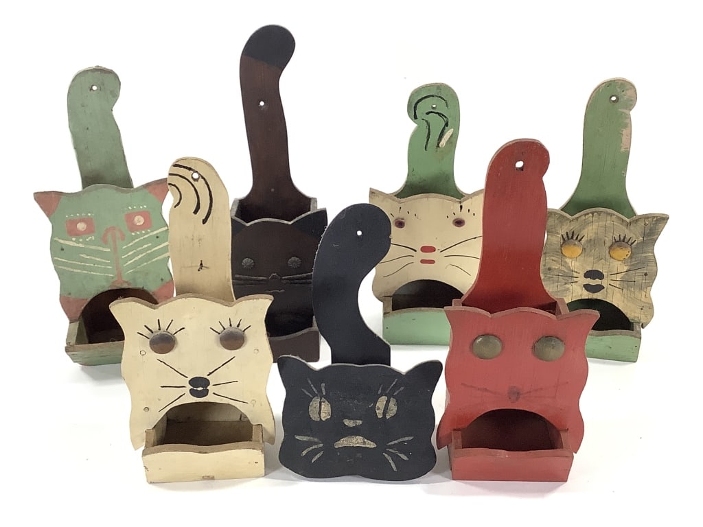 7 Cat Folk Art Matchbox Holders: 8 1/2" to 12"H. 1 of many lots. The walls of the Itter kitchen were covered with hand crafted and painted wood matchbox holders collected over a lifetime. NOTE: due to location these are all as