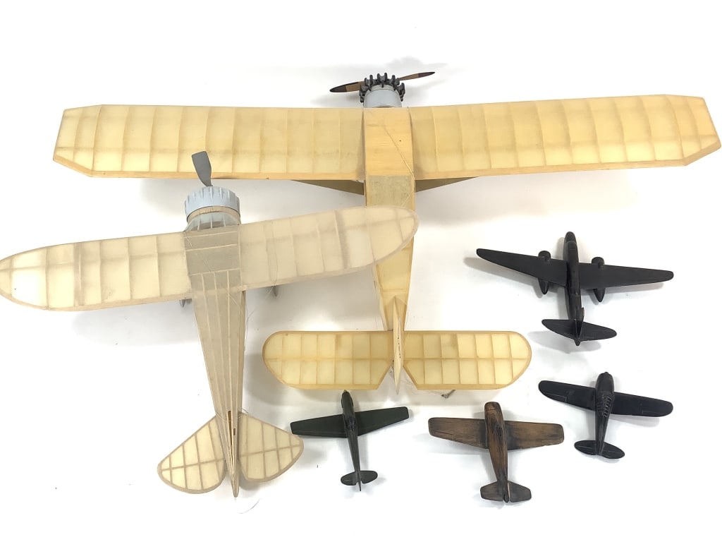 4 Carved Wood 2 Balsa & Tissue Model Airplanes: 4 1/2" to 8"L. Balsa wood, painted and stained. Some minor losses. 19 3/4"W wing span 'Mister Mulligan' model airplane. 34 1/4"W Provenance: Collection of William and Diane Itter.