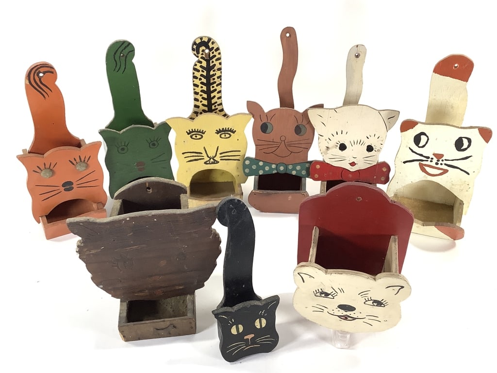 9 Folk Art Cat Matchbox Holders: 6 3/4" to 10"H. 1 of many lots. The walls of the Itter kitchen were covered with hand crafted and painted wood matchbox holders collected over a lifetime. NOTE: due to location these are all as found,