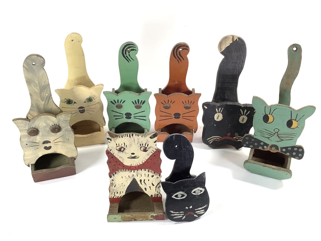 8 Folk Art Cat Matchbox Holders: 6 1/2" to 10 1/4"H. 1 of many lots. The walls of the Itter kitchen were covered with hand crafted and painted wood matchbox holders collected over a lifetime. NOTE: due to location these are all as fo