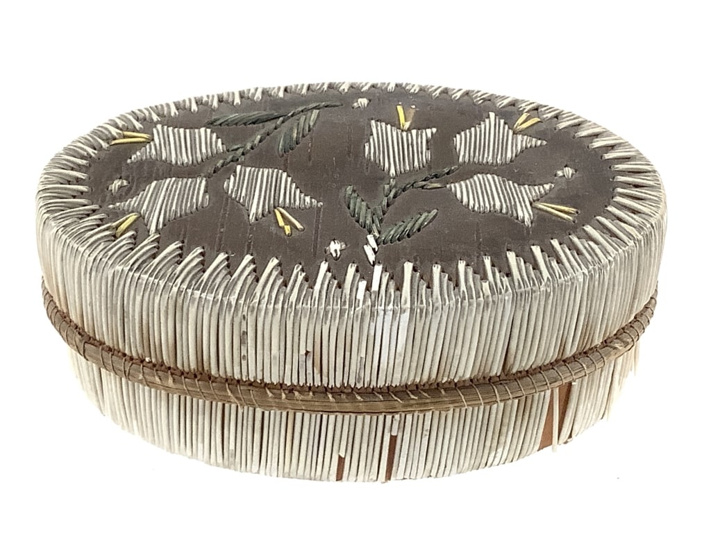 Oval Birchbark & Quill Lidded Box w/ Floral Motif: 4 1/2"L x 2 3/4"W x 1 1/2"H. Shows quill loss / breakage along sides, loose threads, and minor staining. Provenance: Collection of William and Diane Itter.