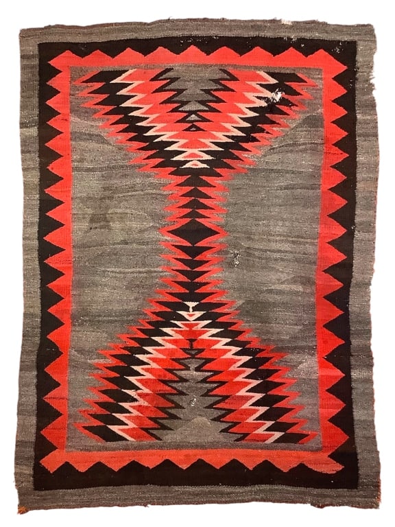 Grando Arizona Hubbell Trading Post Rug: 62 1/2" x 50" w some insect damage. Provenance: William and Diane Itter collection.