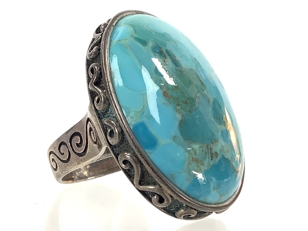 Signed Sterling Oversized Turquoise Ring 30gTW: Size 11. Cabochon measure 1 1/2" L. Good condition. Age related patina.