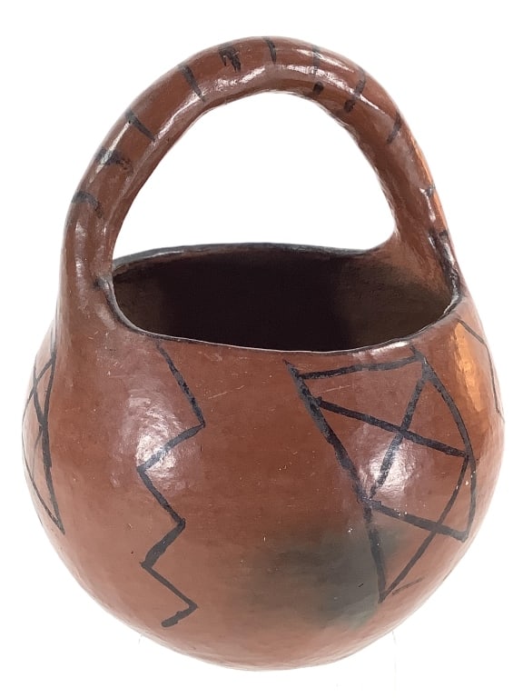 Maricopa Black-on-Red Pottery Basket w/ Handle: 5 3/4"W x 7"H (handle included in measurements). Expected surface wear and paint loss. Minor crack on interior wall. Overall structurally intact. Provenance: Collection of William and Diane Itter.