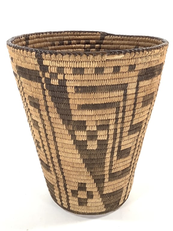 Tall Coiled Basket w/ Geometric Designs: 9 1/4"W x 11"H. Minor coil breakage along bottom. Overall very good condition, structurally intact. Provenance: Collection of William and Diane Itter.