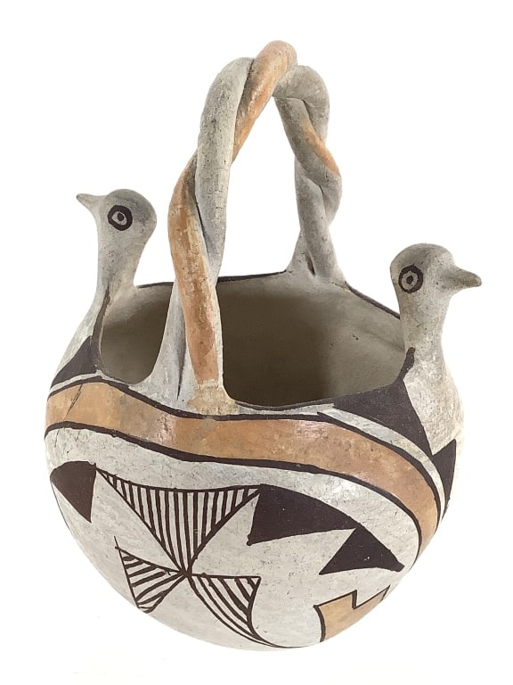 Acoma Pueblo Polychrome Wedding Vase: 4 1/2"W x 6"H. Paint shows surface cracking and expected signs of aging. Small hole has been chipped on bottom. Overall structurally intact. Provenance: Collection of William and Diane Itter.