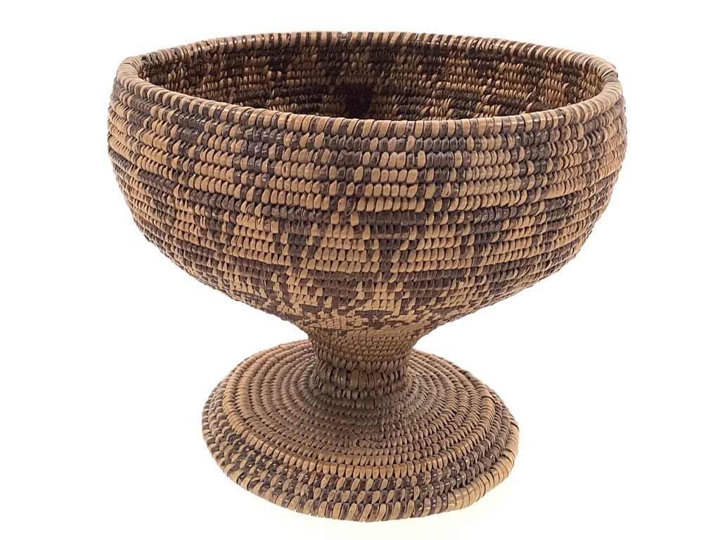 Finely Twined Footed Pedestal Basket: 5"W x 4 1/4"H. Minor damage around rim. Overall structurally intact, body shows tight coiling. Provenance: Collection of William and Diane Itter.