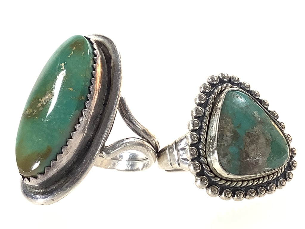 2 Green Turquoise & Sterling Artist Rings 13.5g TW: Oval ring is sz. 8 and triangular ring is sz. 5. Stones are secure; patina present.