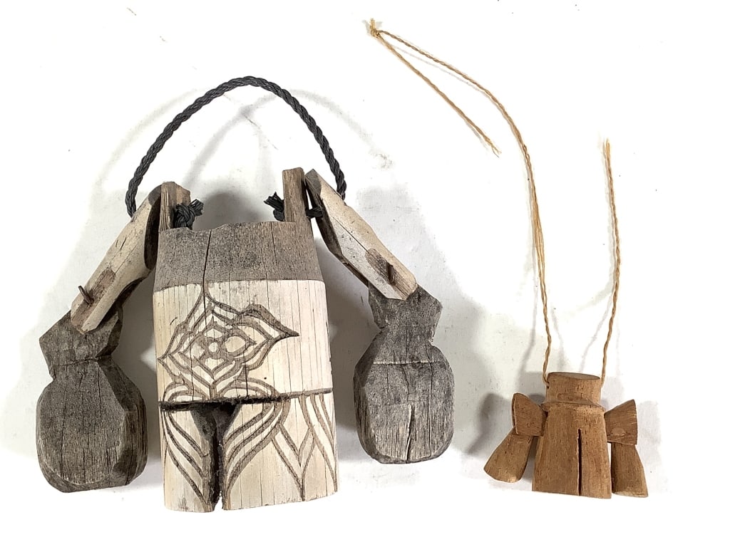 Carved Wood Double Clapper Bells w/ Handles: Largest 5"H. Both intact, handle is broken on smaller bell. Minor surface wear and expected signs of aging.