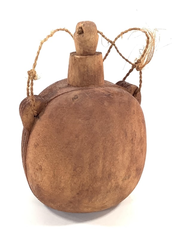 Carved Wood Apache Water Bottle w/ Stopper: 7"H x 5 1/2"W. Woven strap shows heavy fraying to several areas.