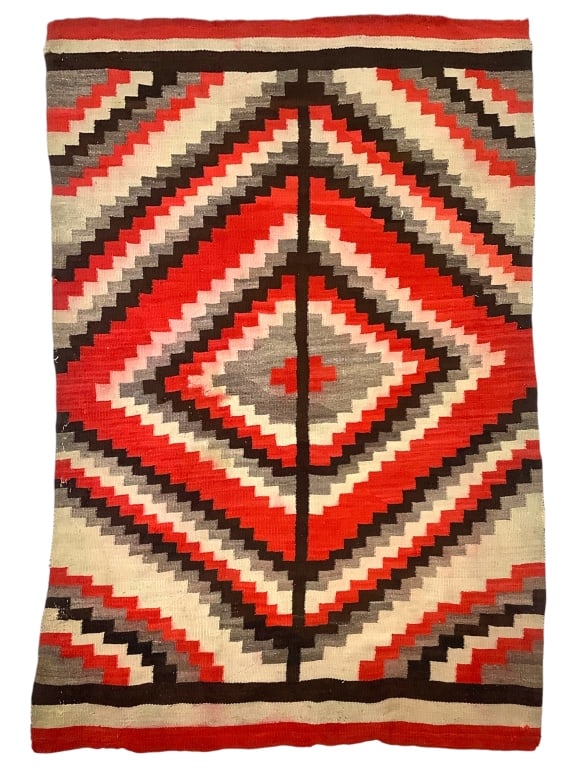 1920s Navajo Wool Eye Dazzler Rug: 26" x 53". Provenance: William and Diane Itter collection.