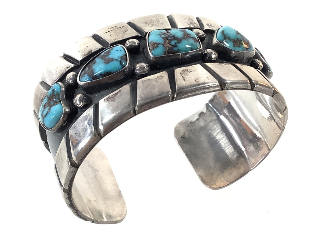 Sterling & Turquoise Cuff 72.8g TW: 6 1/4" L. Unmarked; tested sterling. Good condition; age related patina.