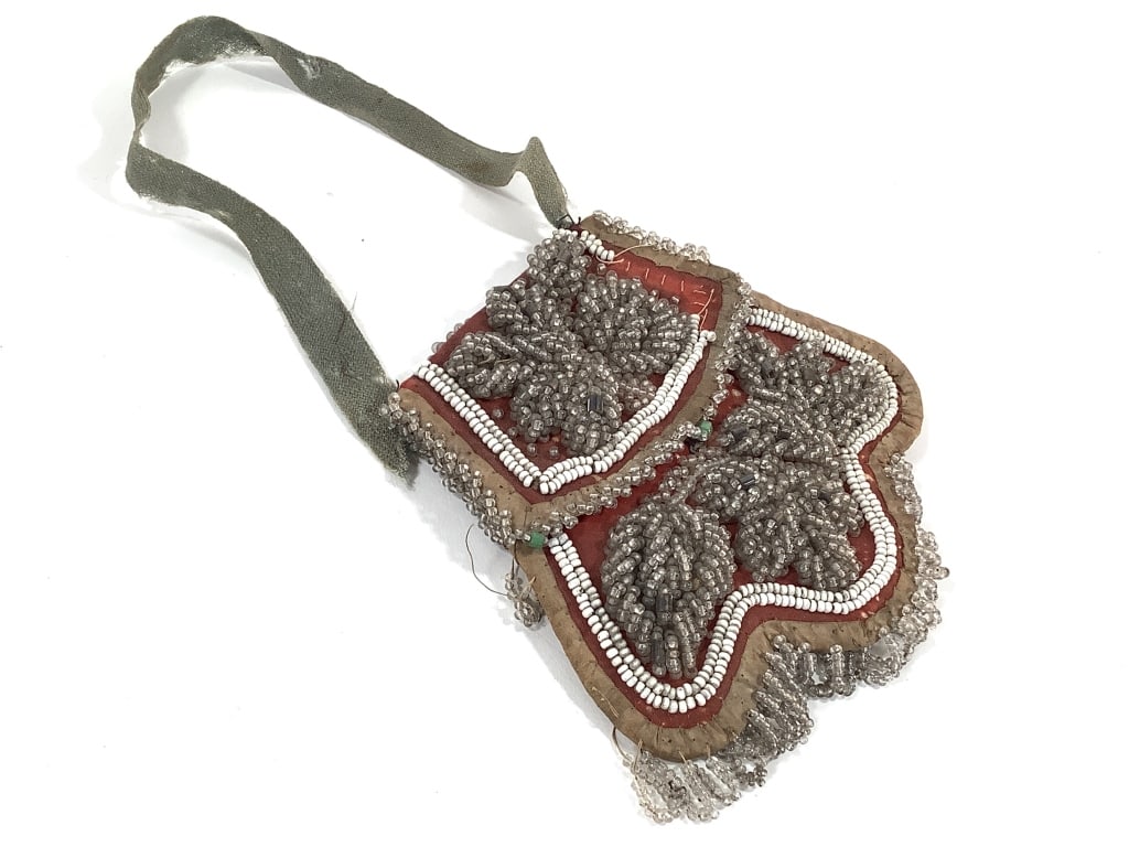 Early Iroquois Beaded Whimsy Bag: 5 1/2"L x 6"W. Loose threads and bead loss in several areas. Handle is fragile and broken.