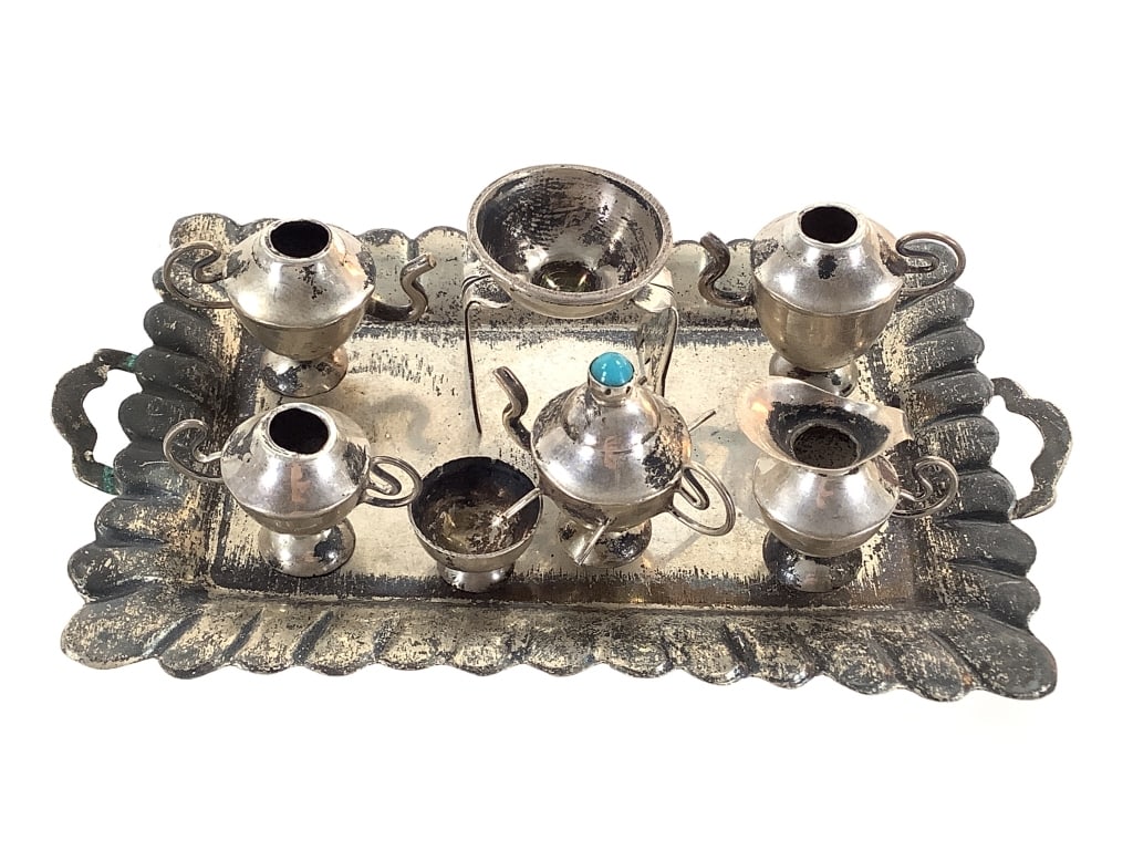 Miniature Sterling Tea Set 36g TW: Tray measures 4" x 2 1/2". Age related patina. Good condition. Marked sterling.